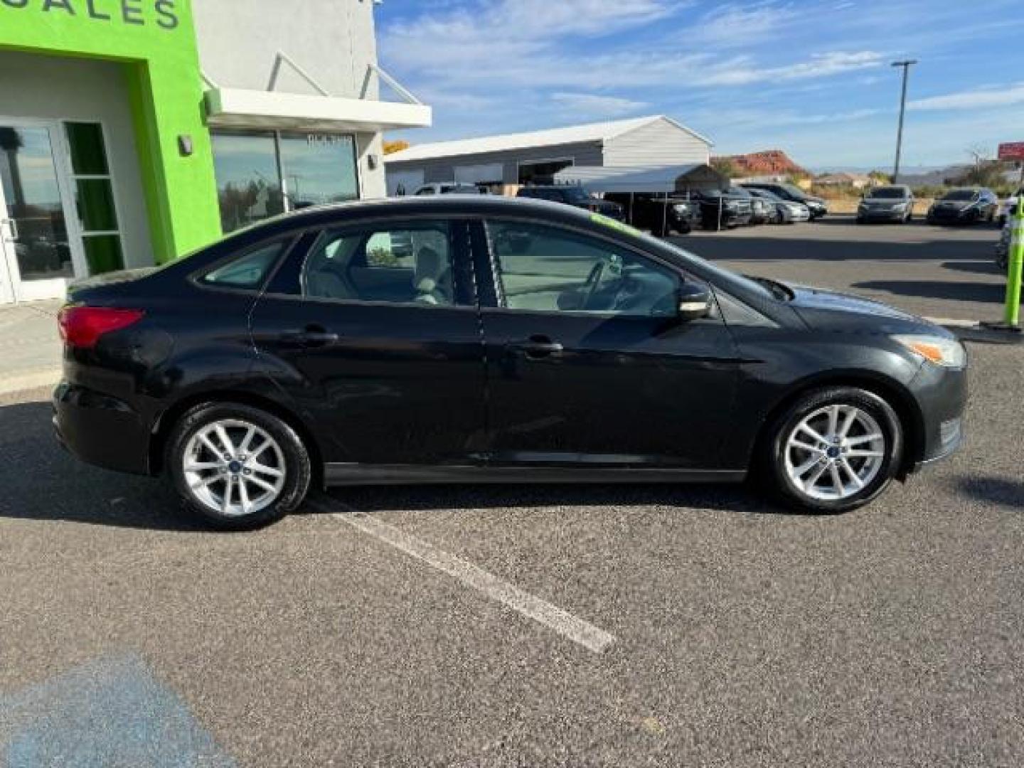 2015 Tuxedo Black Metalli /Charcoal Black Inser Ford Focus SE Sedan (1FADP3F21FL) with an 2.0L L4 DOHC 16V engine, 6-Speed Automatic transmission, located at 940 North Main Street, Cedar City, UT, 84720, (435) 628-0023, 37.692936, -113.061897 - Photo#9