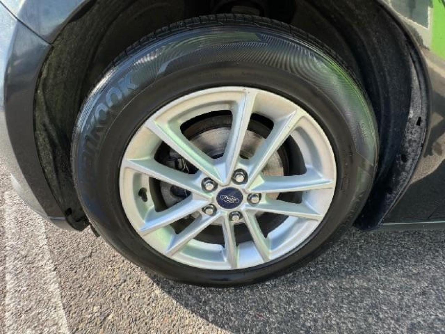 2015 Tuxedo Black Metalli /Charcoal Black Inser Ford Focus SE Sedan (1FADP3F21FL) with an 2.0L L4 DOHC 16V engine, 6-Speed Automatic transmission, located at 940 North Main Street, Cedar City, UT, 84720, (435) 628-0023, 37.692936, -113.061897 - Photo#13