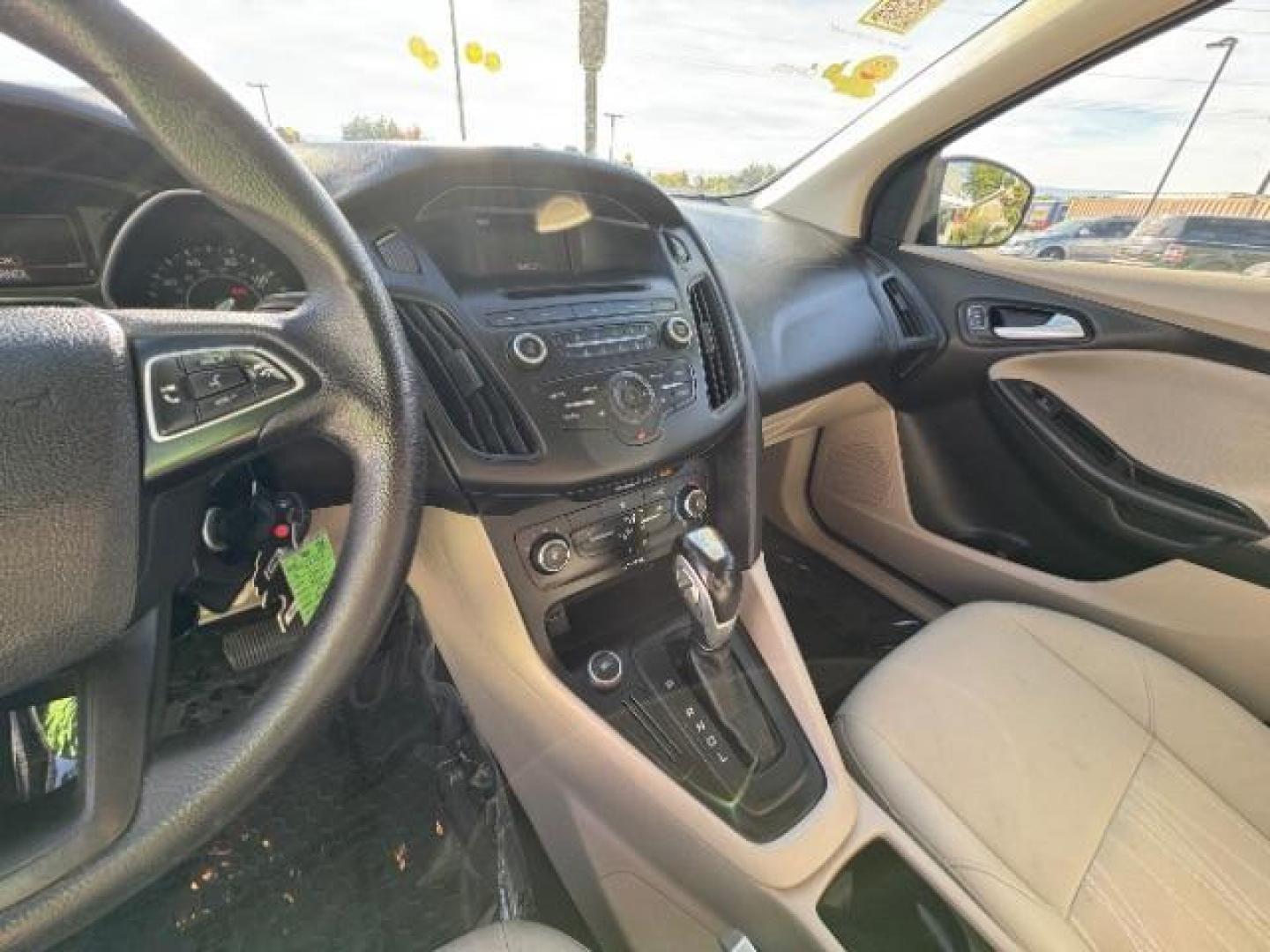 2015 Tuxedo Black Metalli /Charcoal Black Inser Ford Focus SE Sedan (1FADP3F21FL) with an 2.0L L4 DOHC 16V engine, 6-Speed Automatic transmission, located at 940 North Main Street, Cedar City, UT, 84720, (435) 628-0023, 37.692936, -113.061897 - Photo#17