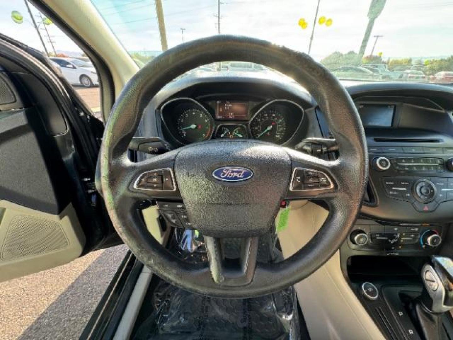 2015 Tuxedo Black Metalli /Charcoal Black Inser Ford Focus SE Sedan (1FADP3F21FL) with an 2.0L L4 DOHC 16V engine, 6-Speed Automatic transmission, located at 940 North Main Street, Cedar City, UT, 84720, (435) 628-0023, 37.692936, -113.061897 - Photo#18