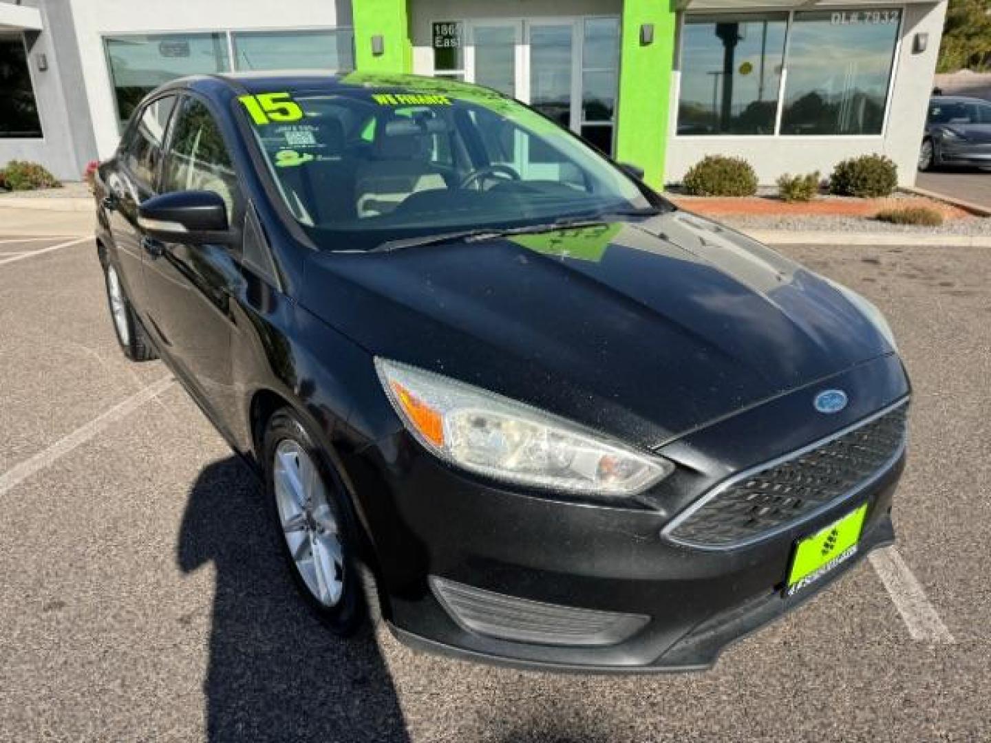 2015 Tuxedo Black Metalli /Charcoal Black Inser Ford Focus SE Sedan (1FADP3F21FL) with an 2.0L L4 DOHC 16V engine, 6-Speed Automatic transmission, located at 940 North Main Street, Cedar City, UT, 84720, (435) 628-0023, 37.692936, -113.061897 - Photo#1