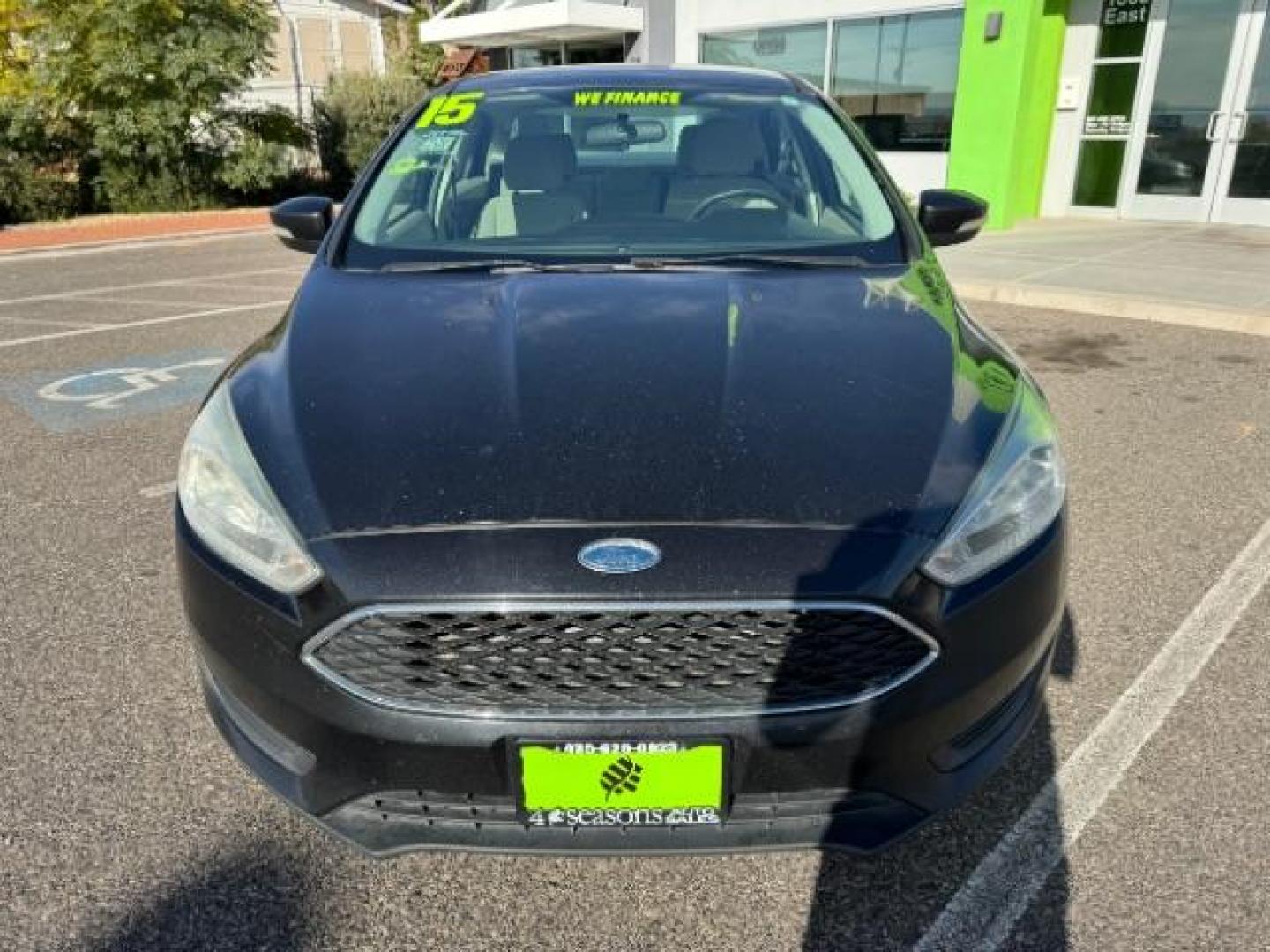 2015 Tuxedo Black Metalli /Charcoal Black Inser Ford Focus SE Sedan (1FADP3F21FL) with an 2.0L L4 DOHC 16V engine, 6-Speed Automatic transmission, located at 940 North Main Street, Cedar City, UT, 84720, (435) 628-0023, 37.692936, -113.061897 - Photo#2