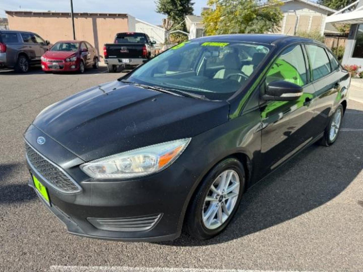 2015 Tuxedo Black Metalli /Charcoal Black Inser Ford Focus SE Sedan (1FADP3F21FL) with an 2.0L L4 DOHC 16V engine, 6-Speed Automatic transmission, located at 940 North Main Street, Cedar City, UT, 84720, (435) 628-0023, 37.692936, -113.061897 - Photo#3