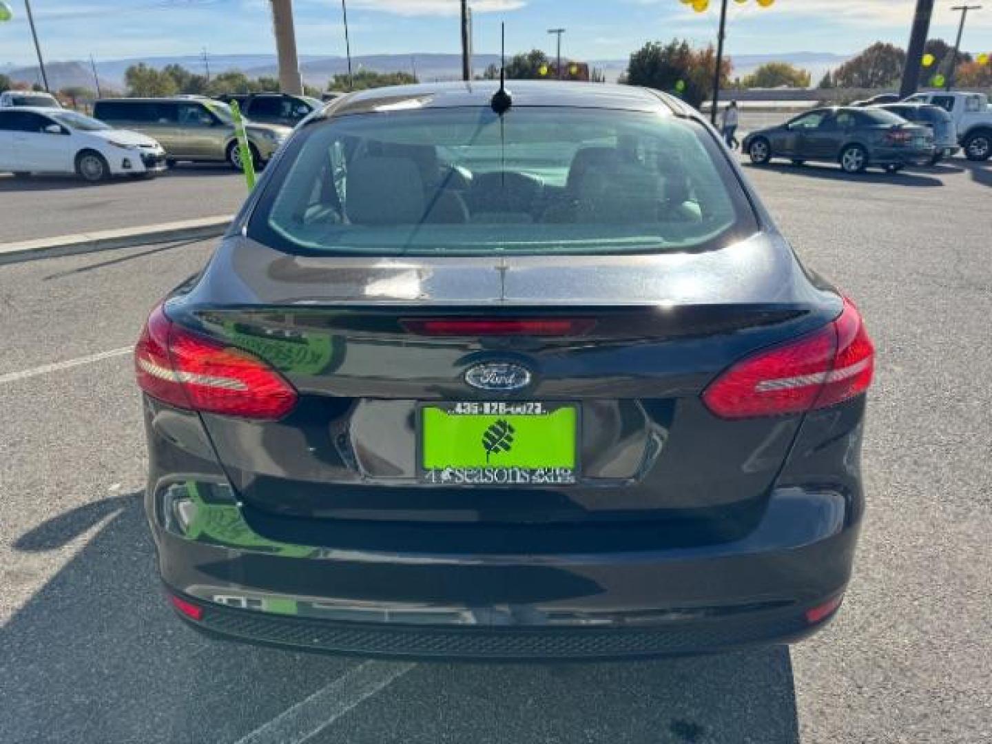 2015 Tuxedo Black Metalli /Charcoal Black Inser Ford Focus SE Sedan (1FADP3F21FL) with an 2.0L L4 DOHC 16V engine, 6-Speed Automatic transmission, located at 940 North Main Street, Cedar City, UT, 84720, (435) 628-0023, 37.692936, -113.061897 - Photo#7