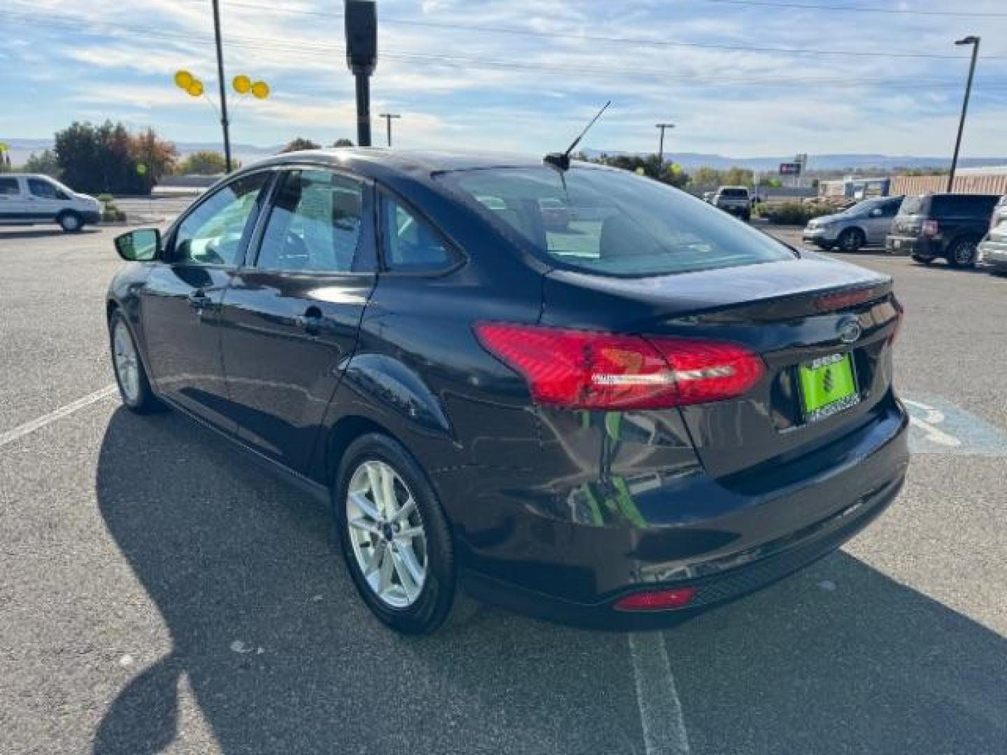 2015 Tuxedo Black Metalli /Charcoal Black Inser Ford Focus SE Sedan (1FADP3F21FL) with an 2.0L L4 DOHC 16V engine, 6-Speed Automatic transmission, located at 940 North Main Street, Cedar City, UT, 84720, (435) 628-0023, 37.692936, -113.061897 - Photo#6