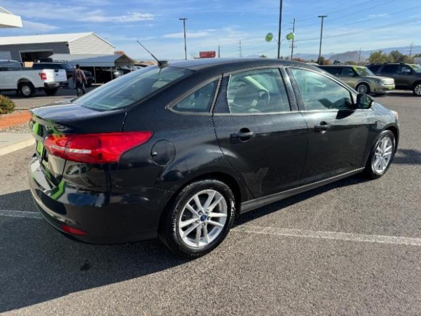 2015 Tuxedo Black Metalli /Charcoal Black Inser Ford Focus SE Sedan (1FADP3F21FL) with an 2.0L L4 DOHC 16V engine, 6-Speed Automatic transmission, located at 940 North Main Street, Cedar City, UT, 84720, (435) 628-0023, 37.692936, -113.061897 - Photo#8