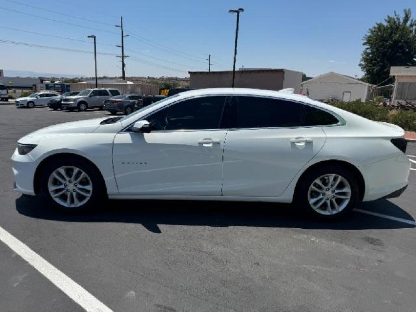 2018 Summit White Chevrolet Malibu SEDAN 4-DR (1G1ZD5ST9JF) with an 1.5L L4 DOHC 16V engine, 6-Speed Automatic transmission, located at 1865 East Red Hills Pkwy, St. George, 84770, (435) 628-0023, 37.120850, -113.543640 - Photo#3