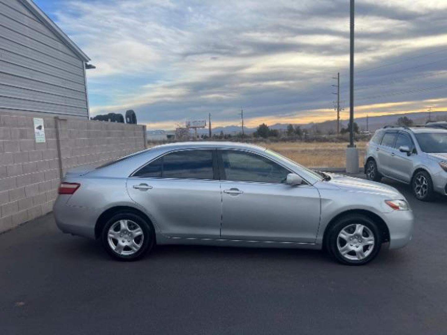 2007 Titanium Metallic /Bisque Cloth Interio Toyota Camry LE V6 (4T1BK46KX7U) with an 3.5L V6 DOHC 24V engine, 6-Speed Automatic transmission, located at 940 North Main Street, Cedar City, UT, 84720, (435) 628-0023, 37.692936, -113.061897 - This vehicle is a Mechanic Special. This means it will need some love. Runs a drives fine but has body damage, leaks or other mechanical issues. It did NOT pass our 50 point inspection. Get a great deal on a less than perfect car. These cars do NOT qualify for our in house financing. Cash and carry, - Photo#7