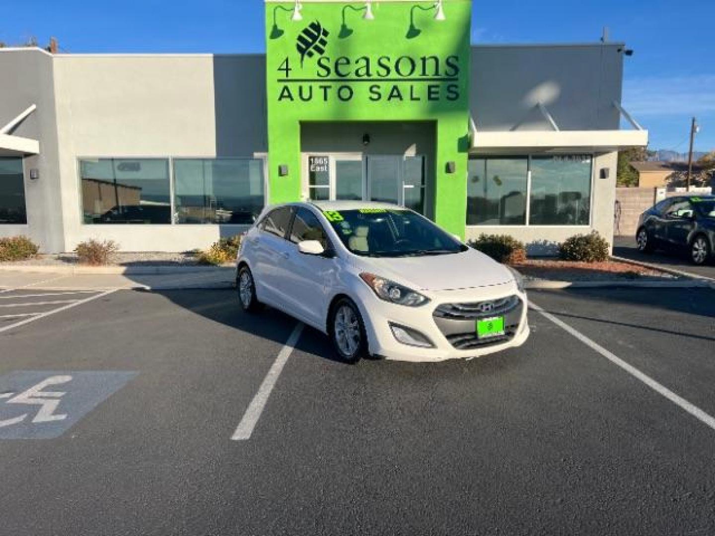 2013 Monaco White /Beige Cloth Interior Hyundai Elantra GT A/T (KMHD35LE6DU) with an 1.8L L4 16V DOHC engine, 6-Speed Automatic transmission, located at 1865 East Red Hills Pkwy, St. George, 84770, (435) 628-0023, 37.120850, -113.543640 - We specialize in helping ALL people get the best financing available. No matter your credit score, good, bad or none we can get you an amazing rate. Had a bankruptcy, divorce, or repossessions? We give you the green light to get your credit back on the road. Low down and affordable payments that fit - Photo#0