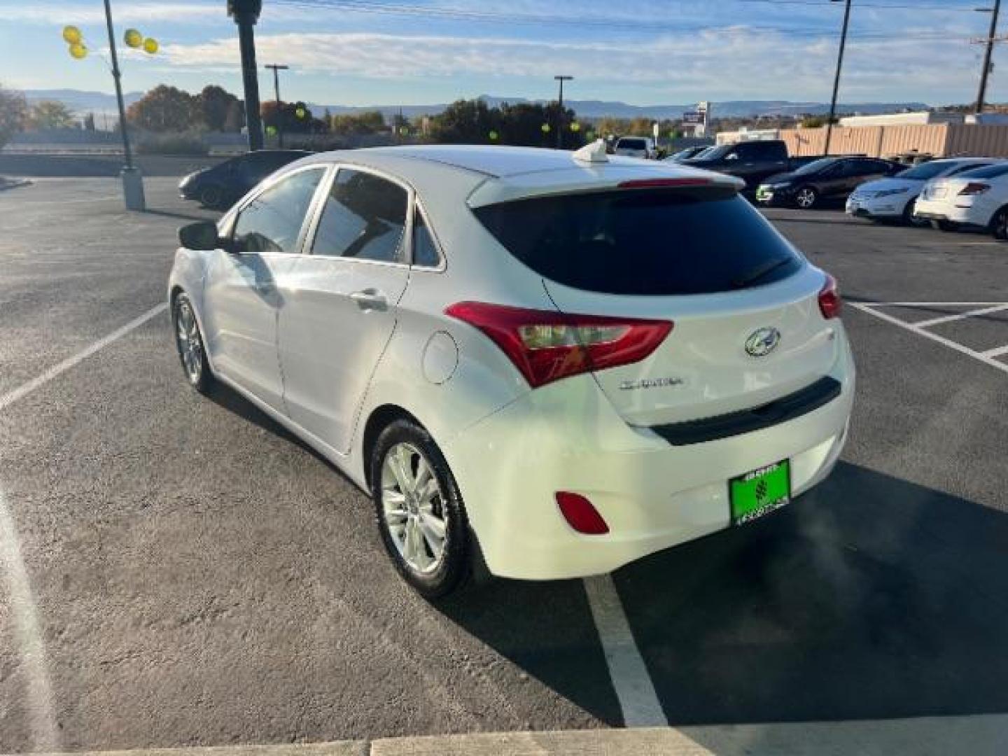 2013 Monaco White /Beige Cloth Interior Hyundai Elantra GT A/T (KMHD35LE6DU) with an 1.8L L4 16V DOHC engine, 6-Speed Automatic transmission, located at 1865 East Red Hills Pkwy, St. George, 84770, (435) 628-0023, 37.120850, -113.543640 - We specialize in helping ALL people get the best financing available. No matter your credit score, good, bad or none we can get you an amazing rate. Had a bankruptcy, divorce, or repossessions? We give you the green light to get your credit back on the road. Low down and affordable payments that fit - Photo#4