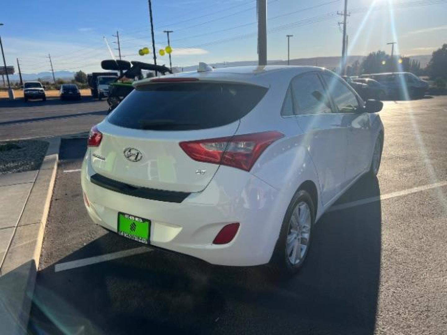 2013 Monaco White /Beige Cloth Interior Hyundai Elantra GT A/T (KMHD35LE6DU) with an 1.8L L4 16V DOHC engine, 6-Speed Automatic transmission, located at 1865 East Red Hills Pkwy, St. George, 84770, (435) 628-0023, 37.120850, -113.543640 - We specialize in helping ALL people get the best financing available. No matter your credit score, good, bad or none we can get you an amazing rate. Had a bankruptcy, divorce, or repossessions? We give you the green light to get your credit back on the road. Low down and affordable payments that fit - Photo#6