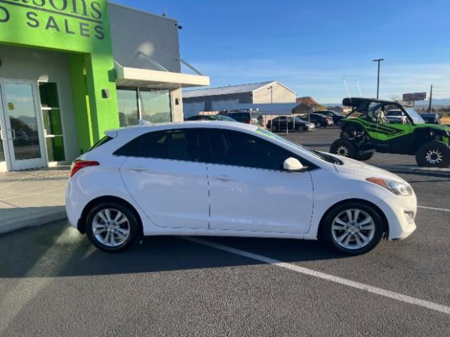 2013 Monaco White /Beige Cloth Interior Hyundai Elantra GT A/T (KMHD35LE6DU) with an 1.8L L4 16V DOHC engine, 6-Speed Automatic transmission, located at 1865 East Red Hills Pkwy, St. George, 84770, (435) 628-0023, 37.120850, -113.543640 - We specialize in helping ALL people get the best financing available. No matter your credit score, good, bad or none we can get you an amazing rate. Had a bankruptcy, divorce, or repossessions? We give you the green light to get your credit back on the road. Low down and affordable payments that fit - Photo#7