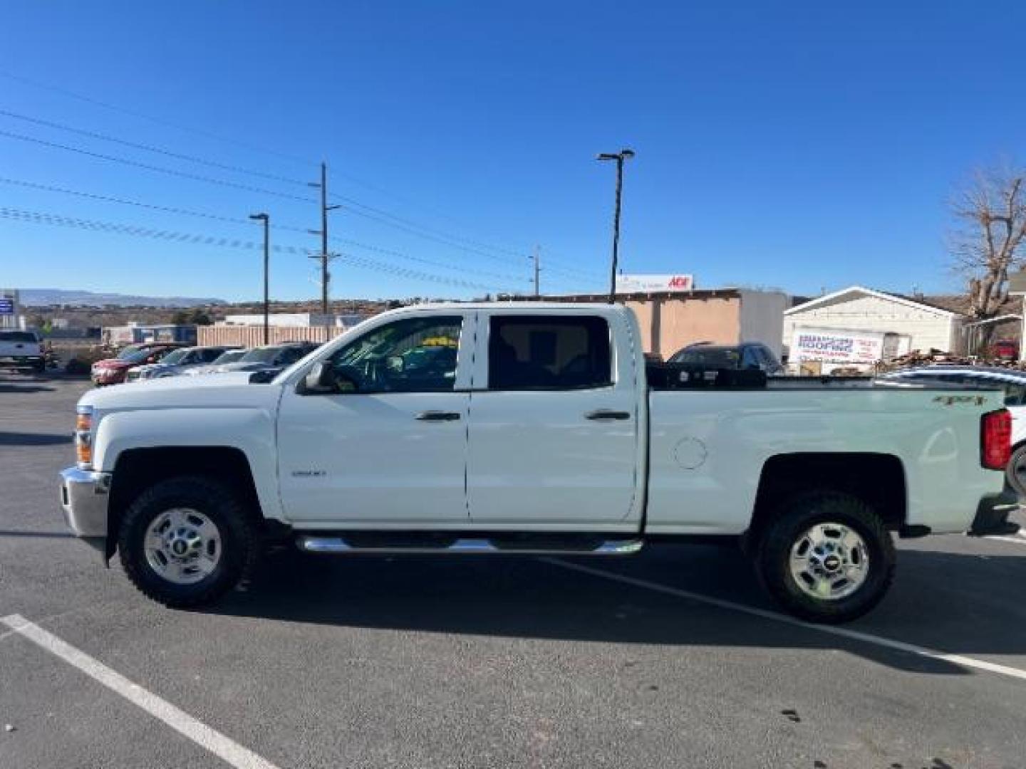 2015 Summit White /Jet Black Chevrolet Silverado 2500HD LT Crew Cab 4WD (1GC1KVEB3FF) with an 6.0L V8 OHV 16V CNG engine, 6-Speed Automatic transmission, located at 1865 East Red Hills Pkwy, St. George, 84770, (435) 628-0023, 37.120850, -113.543640 - We specialize in helping ALL people get the best financing available. No matter your credit score, good, bad or none we can get you an amazing rate. Had a bankruptcy, divorce, or repossessions? We give you the green light to get your credit back on the road. Low down and affordable payments that fit - Photo#3