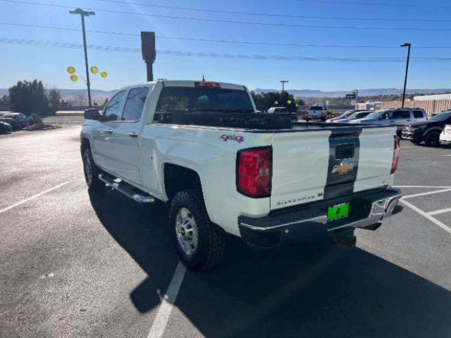 2015 Summit White /Jet Black Chevrolet Silverado 2500HD LT Crew Cab 4WD (1GC1KVEB3FF) with an 6.0L V8 OHV 16V CNG engine, 6-Speed Automatic transmission, located at 1865 East Red Hills Pkwy, St. George, 84770, (435) 628-0023, 37.120850, -113.543640 - We specialize in helping ALL people get the best financing available. No matter your credit score, good, bad or none we can get you an amazing rate. Had a bankruptcy, divorce, or repossessions? We give you the green light to get your credit back on the road. Low down and affordable payments that fit - Photo#4