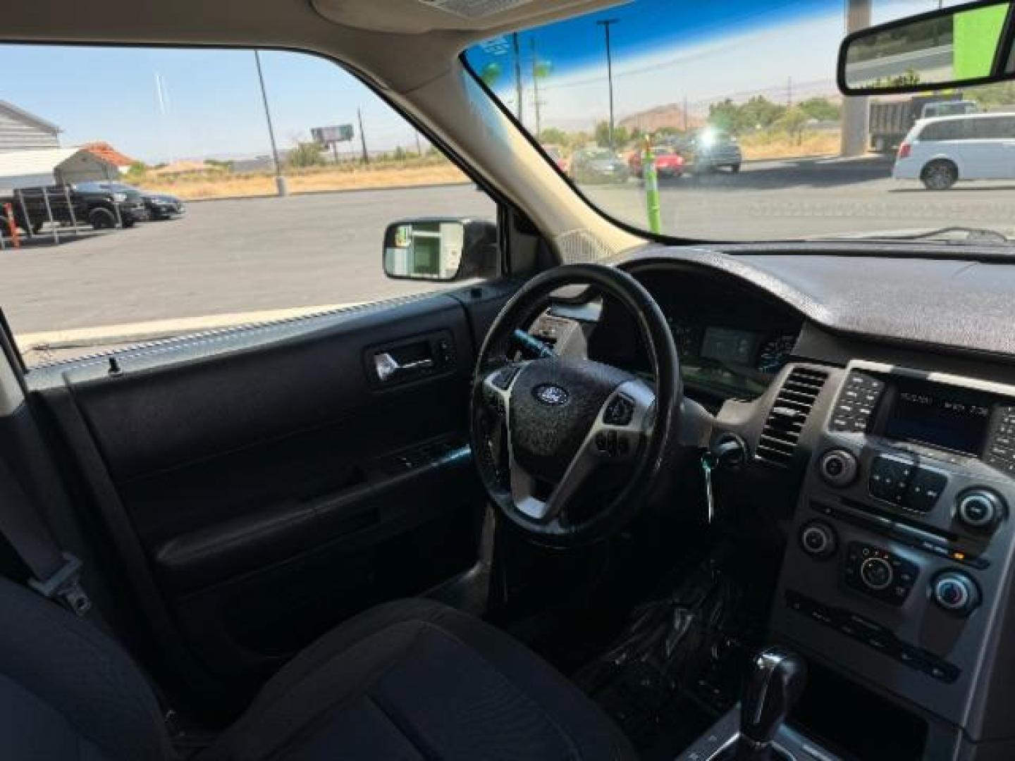 2013 Mineral Gray Metalli /Charcoal Black Cloth Ford Flex SE FWD (2FMGK5B89DB) with an 3.5L V6 DOHC 24V engine, 6-Speed Automatic Ov transmission, located at 1865 East Red Hills Pkwy, St. George, 84770, (435) 628-0023, 37.120850, -113.543640 - We specialize in helping ALL people get the best financing available. No matter your credit score, good, bad or none we can get you an amazing rate. Had a bankruptcy, divorce, or repossessions? We give you the green light to get your credit back on the road. Low down and affordable payments that fit - Photo#33