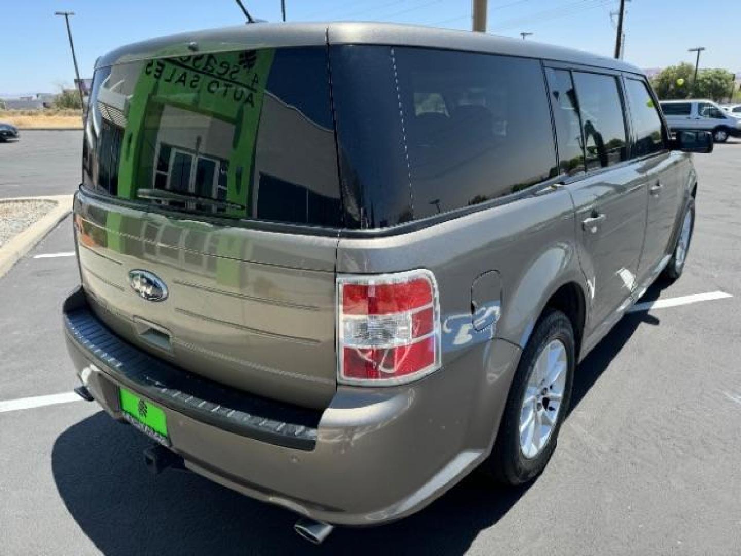 2013 Mineral Gray Metalli /Charcoal Black Cloth Ford Flex SE FWD (2FMGK5B89DB) with an 3.5L V6 DOHC 24V engine, 6-Speed Automatic Ov transmission, located at 1865 East Red Hills Pkwy, St. George, 84770, (435) 628-0023, 37.120850, -113.543640 - We specialize in helping ALL people get the best financing available. No matter your credit score, good, bad or none we can get you an amazing rate. Had a bankruptcy, divorce, or repossessions? We give you the green light to get your credit back on the road. Low down and affordable payments that fit - Photo#6