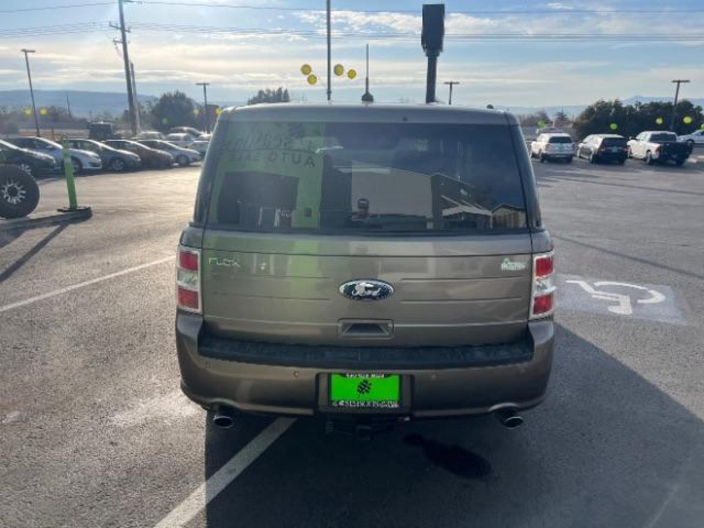 2013 Mineral Gray Metallic /Charcoal Black Cloth Ford Flex SE FWD (2FMGK5B89DB) with an 3.5L V6 DOHC 24V engine, 6-Speed Automatic Ov transmission, located at 1865 East Red Hills Pkwy, St. George, 84770, (435) 628-0023, 37.120850, -113.543640 - We specialize in helping ALL people get the best financing available. No matter your credit score, good, bad or none we can get you an amazing rate. Had a bankruptcy, divorce, or repossessions? We give you the green light to get your credit back on the road. Low down and affordable payments that fit - Photo#5