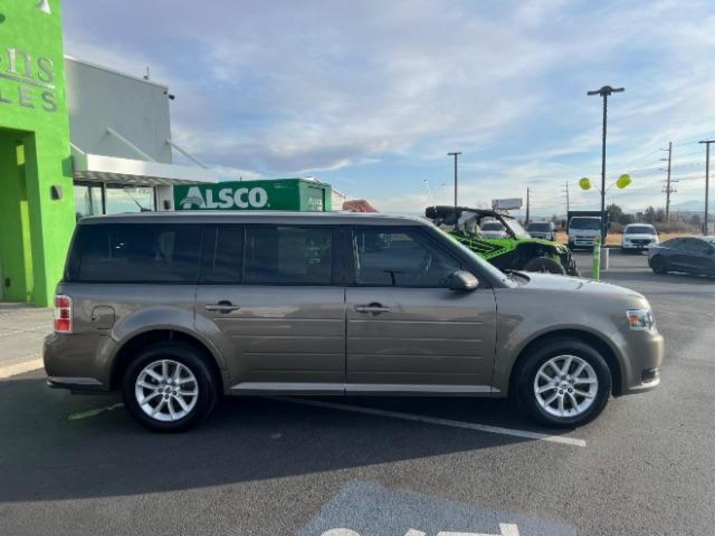 2013 Mineral Gray Metallic /Charcoal Black Cloth Ford Flex SE FWD (2FMGK5B89DB) with an 3.5L V6 DOHC 24V engine, 6-Speed Automatic Ov transmission, located at 1865 East Red Hills Pkwy, St. George, 84770, (435) 628-0023, 37.120850, -113.543640 - We specialize in helping ALL people get the best financing available. No matter your credit score, good, bad or none we can get you an amazing rate. Had a bankruptcy, divorce, or repossessions? We give you the green light to get your credit back on the road. Low down and affordable payments that fit - Photo#7