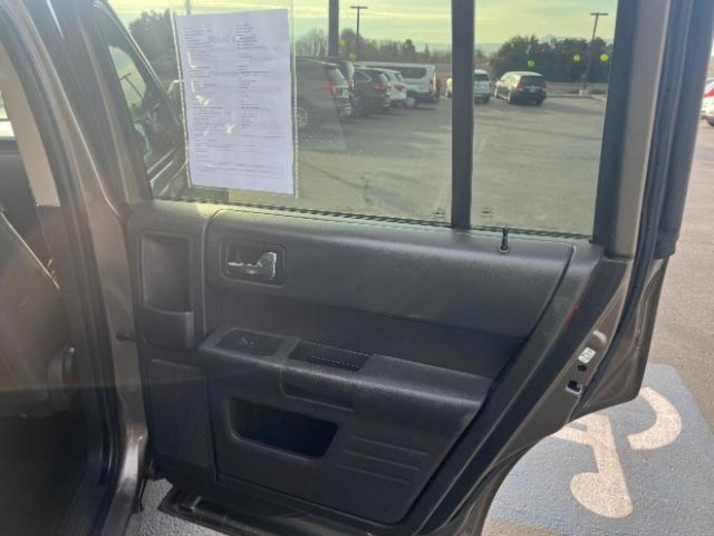 2013 Mineral Gray Metallic /Charcoal Black Cloth Ford Flex SE FWD (2FMGK5B89DB) with an 3.5L V6 DOHC 24V engine, 6-Speed Automatic Ov transmission, located at 1865 East Red Hills Pkwy, St. George, 84770, (435) 628-0023, 37.120850, -113.543640 - We specialize in helping ALL people get the best financing available. No matter your credit score, good, bad or none we can get you an amazing rate. Had a bankruptcy, divorce, or repossessions? We give you the green light to get your credit back on the road. Low down and affordable payments that fit - Photo#26