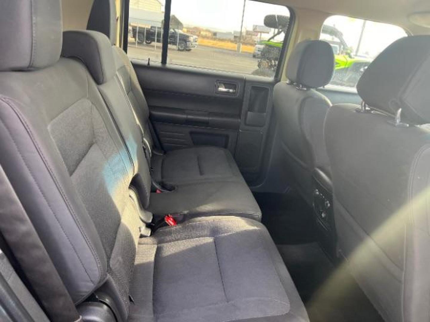 2013 Mineral Gray Metallic /Charcoal Black Cloth Ford Flex SE FWD (2FMGK5B89DB) with an 3.5L V6 DOHC 24V engine, 6-Speed Automatic Ov transmission, located at 1865 East Red Hills Pkwy, St. George, 84770, (435) 628-0023, 37.120850, -113.543640 - We specialize in helping ALL people get the best financing available. No matter your credit score, good, bad or none we can get you an amazing rate. Had a bankruptcy, divorce, or repossessions? We give you the green light to get your credit back on the road. Low down and affordable payments that fit - Photo#27