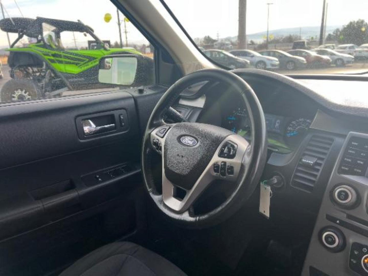 2013 Mineral Gray Metallic /Charcoal Black Cloth Ford Flex SE FWD (2FMGK5B89DB) with an 3.5L V6 DOHC 24V engine, 6-Speed Automatic Ov transmission, located at 1865 East Red Hills Pkwy, St. George, 84770, (435) 628-0023, 37.120850, -113.543640 - We specialize in helping ALL people get the best financing available. No matter your credit score, good, bad or none we can get you an amazing rate. Had a bankruptcy, divorce, or repossessions? We give you the green light to get your credit back on the road. Low down and affordable payments that fit - Photo#31