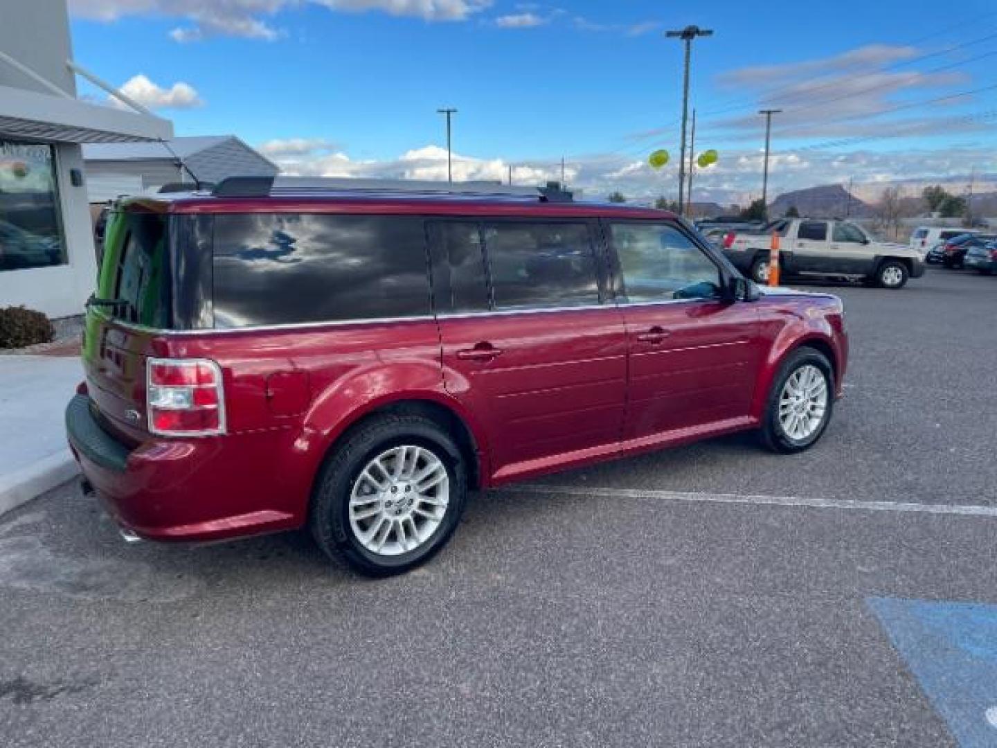 2014 Ruby Red Met Tinted /Charcoal Black Ford Flex SEL FWD (2FMGK5C81EB) with an 3.5L V6 DOHC 24V engine, 6-Speed Automatic Ov transmission, located at 1865 East Red Hills Pkwy, St. George, 84770, (435) 628-0023, 37.120850, -113.543640 - We specialize in helping ALL people get the best financing available. No matter your credit score, good, bad or none we can get you an amazing rate. Had a bankruptcy, divorce, or repossessions? We give you the green light to get your credit back on the road. Low down and affordable payments that fit - Photo#10