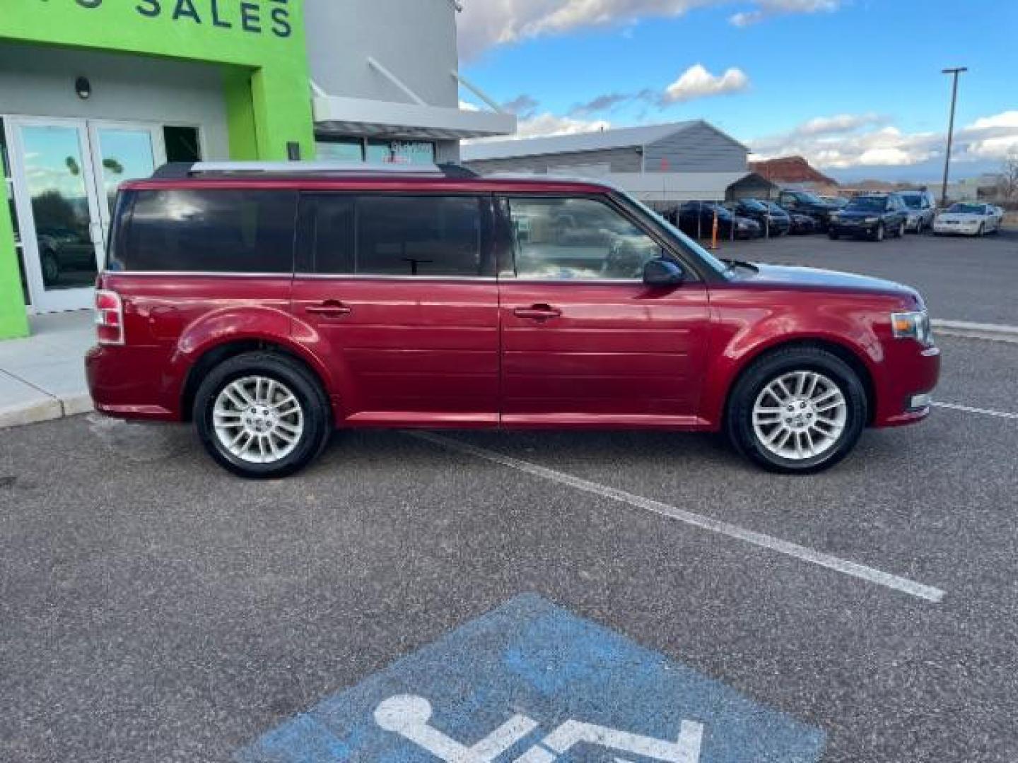 2014 Ruby Red Met Tinted /Charcoal Black Ford Flex SEL FWD (2FMGK5C81EB) with an 3.5L V6 DOHC 24V engine, 6-Speed Automatic Ov transmission, located at 1865 East Red Hills Pkwy, St. George, 84770, (435) 628-0023, 37.120850, -113.543640 - We specialize in helping ALL people get the best financing available. No matter your credit score, good, bad or none we can get you an amazing rate. Had a bankruptcy, divorce, or repossessions? We give you the green light to get your credit back on the road. Low down and affordable payments that fit - Photo#11