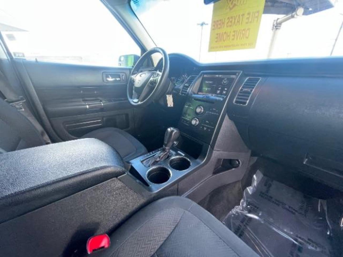 2014 Ruby Red Met Tinted /Charcoal Black Ford Flex SEL FWD (2FMGK5C81EB) with an 3.5L V6 DOHC 24V engine, 6-Speed Automatic Ov transmission, located at 1865 East Red Hills Pkwy, St. George, 84770, (435) 628-0023, 37.120850, -113.543640 - We specialize in helping ALL people get the best financing available. No matter your credit score, good, bad or none we can get you an amazing rate. Had a bankruptcy, divorce, or repossessions? We give you the green light to get your credit back on the road. Low down and affordable payments that fit - Photo#36