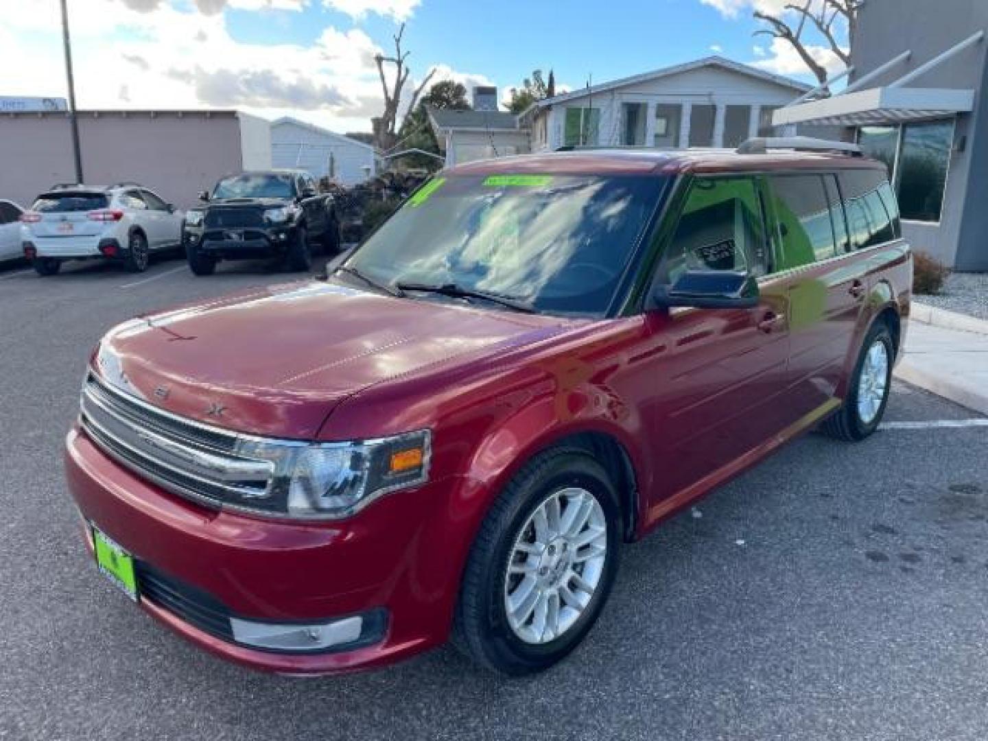 2014 Ruby Red Met Tinted /Charcoal Black Ford Flex SEL FWD (2FMGK5C81EB) with an 3.5L V6 DOHC 24V engine, 6-Speed Automatic Ov transmission, located at 1865 East Red Hills Pkwy, St. George, 84770, (435) 628-0023, 37.120850, -113.543640 - We specialize in helping ALL people get the best financing available. No matter your credit score, good, bad or none we can get you an amazing rate. Had a bankruptcy, divorce, or repossessions? We give you the green light to get your credit back on the road. Low down and affordable payments that fit - Photo#3