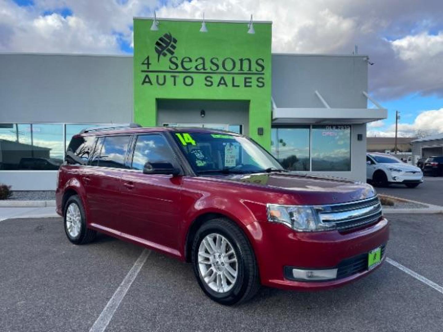 2014 Ruby Red Met Tinted /Charcoal Black Ford Flex SEL FWD (2FMGK5C81EB) with an 3.5L V6 DOHC 24V engine, 6-Speed Automatic Ov transmission, located at 1865 East Red Hills Pkwy, St. George, 84770, (435) 628-0023, 37.120850, -113.543640 - We specialize in helping ALL people get the best financing available. No matter your credit score, good, bad or none we can get you an amazing rate. Had a bankruptcy, divorce, or repossessions? We give you the green light to get your credit back on the road. Low down and affordable payments that fit - Photo#0