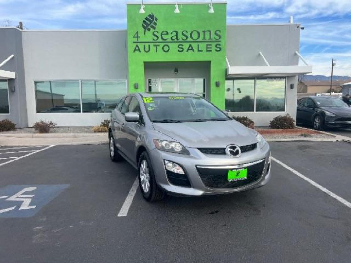 2012 Liquid Silver Metallic /Black Cloth Interior Mazda CX-7 i Sport (JM3ER2BM5C0) with an 2.5L L4 DOHC 16V engine, 5-Speed Automatic transmission, located at 1865 East Red Hills Pkwy, St. George, 84770, (435) 628-0023, 37.120850, -113.543640 - Photo#0