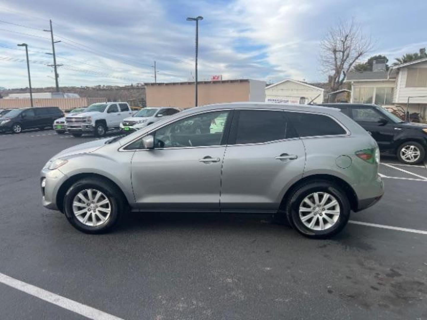 2012 Liquid Silver Metallic /Black Cloth Interior Mazda CX-7 i Sport (JM3ER2BM5C0) with an 2.5L L4 DOHC 16V engine, 5-Speed Automatic transmission, located at 1865 East Red Hills Pkwy, St. George, 84770, (435) 628-0023, 37.120850, -113.543640 - Photo#3