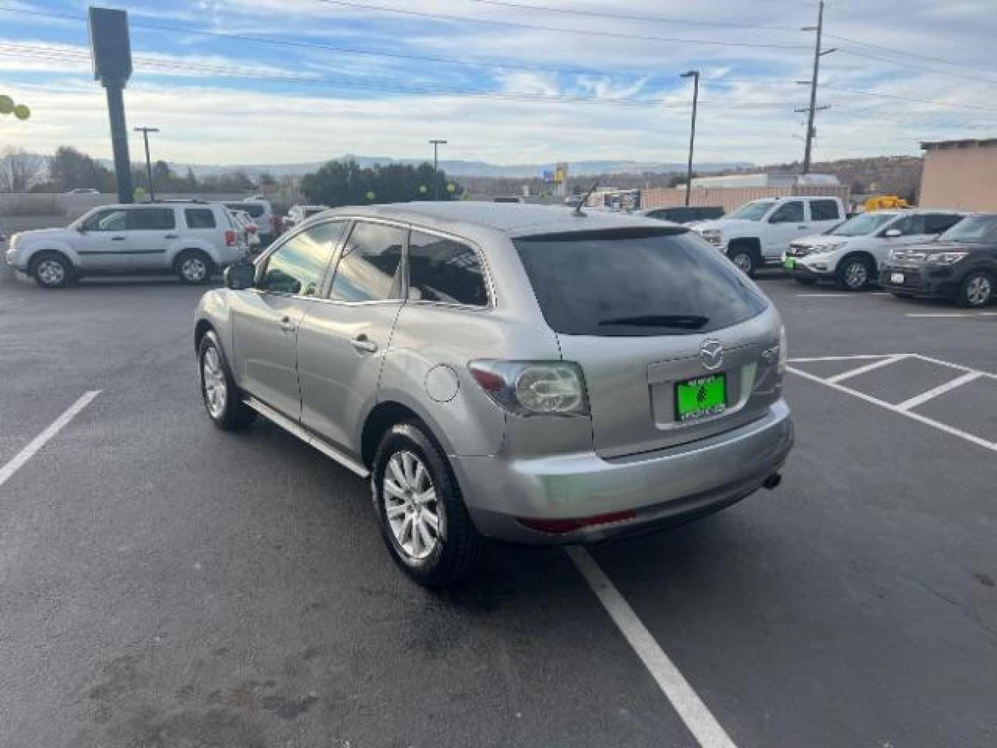 2012 Liquid Silver Metallic /Black Cloth Interior Mazda CX-7 i Sport (JM3ER2BM5C0) with an 2.5L L4 DOHC 16V engine, 5-Speed Automatic transmission, located at 1865 East Red Hills Pkwy, St. George, 84770, (435) 628-0023, 37.120850, -113.543640 - Photo#4