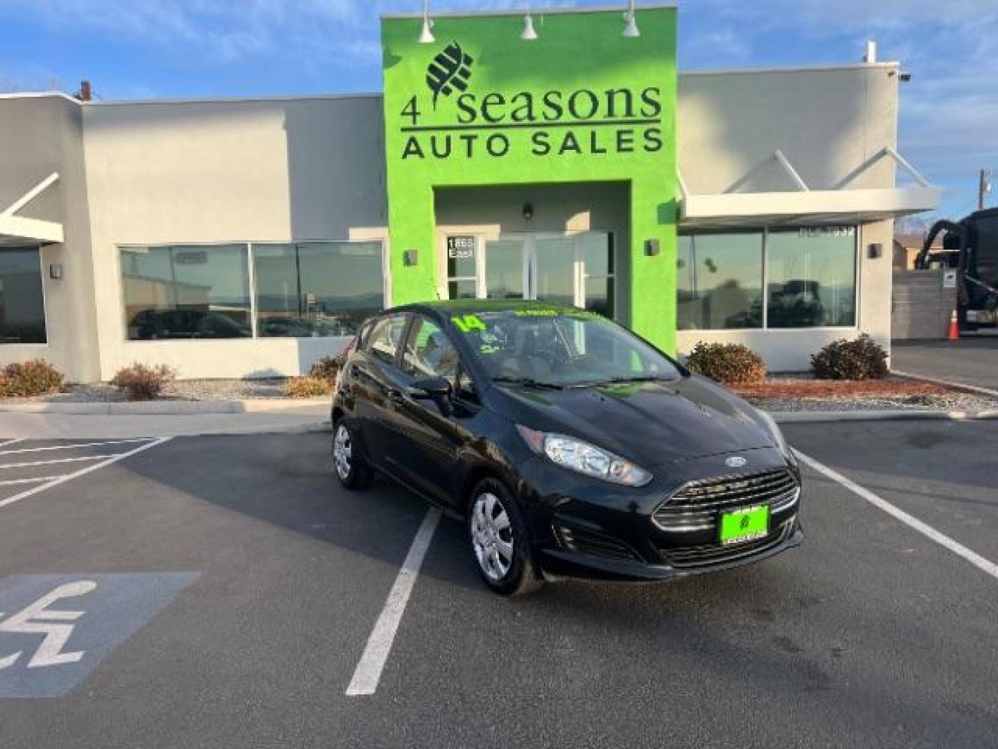 2014 Tuxedo Black Metalli /Charcoal Black Ford Fiesta SE Hatchback (3FADP4EJ0EM) with an 1.6L L4 DOHC 16V engine, 6-Speed Automatic transmission, located at 1865 East Red Hills Pkwy, St. George, 84770, (435) 628-0023, 37.120850, -113.543640 - We specialize in helping ALL people get the best financing available. No matter your credit score, good, bad or none we can get you an amazing rate. Had a bankruptcy, divorce, or repossessions? We give you the green light to get your credit back on the road. Low down and affordable payments that fit - Photo#0