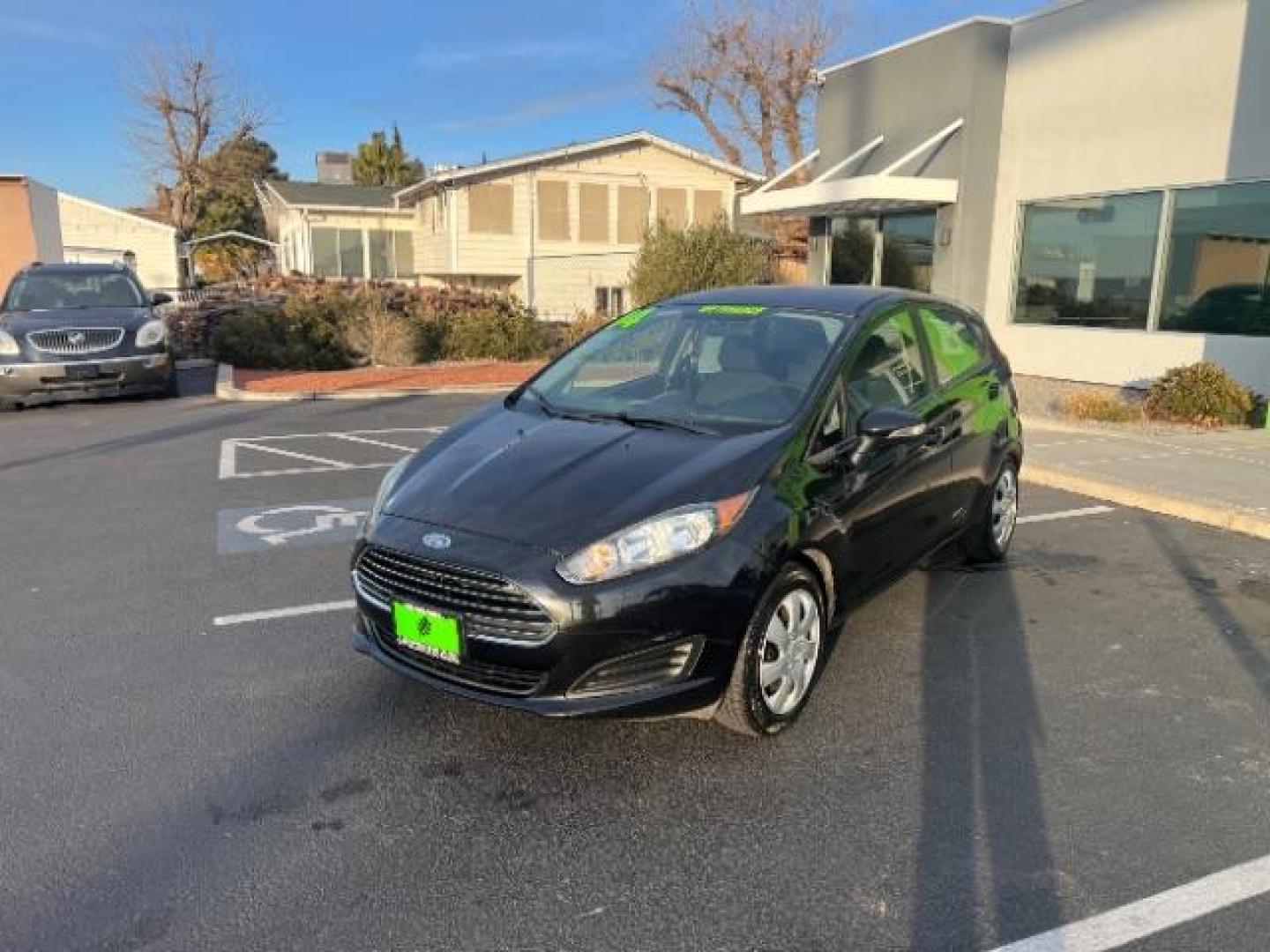 2014 Tuxedo Black Metalli /Charcoal Black Ford Fiesta SE Hatchback (3FADP4EJ0EM) with an 1.6L L4 DOHC 16V engine, 6-Speed Automatic transmission, located at 1865 East Red Hills Pkwy, St. George, 84770, (435) 628-0023, 37.120850, -113.543640 - We specialize in helping ALL people get the best financing available. No matter your credit score, good, bad or none we can get you an amazing rate. Had a bankruptcy, divorce, or repossessions? We give you the green light to get your credit back on the road. Low down and affordable payments that fit - Photo#2