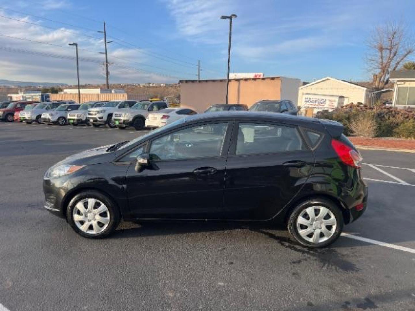 2014 Tuxedo Black Metalli /Charcoal Black Ford Fiesta SE Hatchback (3FADP4EJ0EM) with an 1.6L L4 DOHC 16V engine, 6-Speed Automatic transmission, located at 1865 East Red Hills Pkwy, St. George, 84770, (435) 628-0023, 37.120850, -113.543640 - We specialize in helping ALL people get the best financing available. No matter your credit score, good, bad or none we can get you an amazing rate. Had a bankruptcy, divorce, or repossessions? We give you the green light to get your credit back on the road. Low down and affordable payments that fit - Photo#3