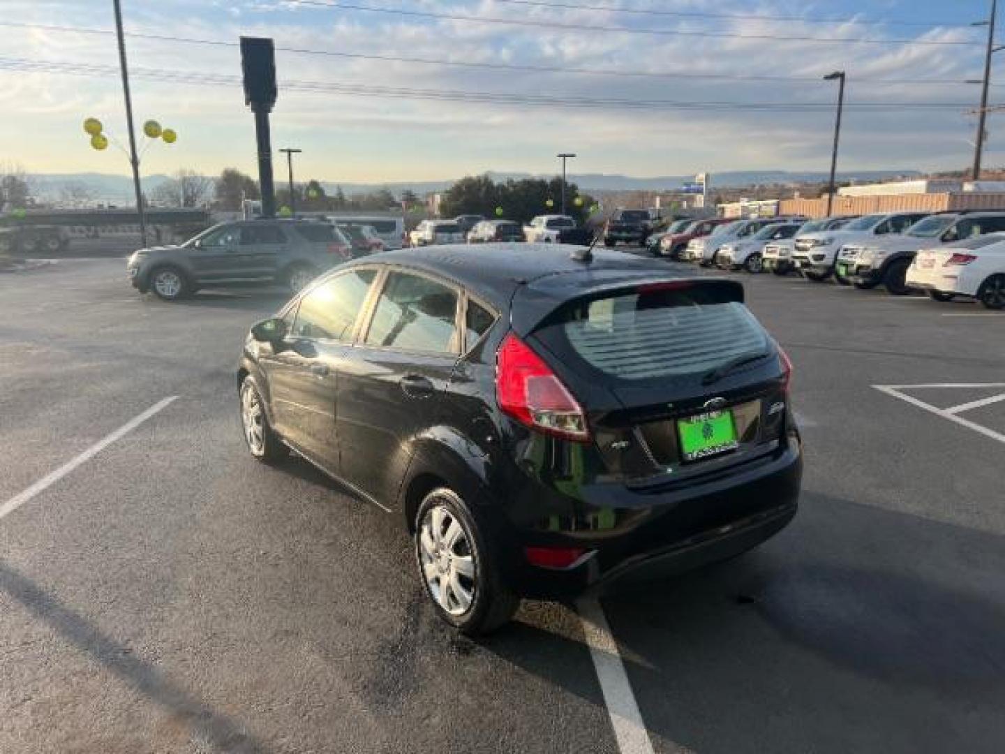 2014 Tuxedo Black Metalli /Charcoal Black Ford Fiesta SE Hatchback (3FADP4EJ0EM) with an 1.6L L4 DOHC 16V engine, 6-Speed Automatic transmission, located at 1865 East Red Hills Pkwy, St. George, 84770, (435) 628-0023, 37.120850, -113.543640 - We specialize in helping ALL people get the best financing available. No matter your credit score, good, bad or none we can get you an amazing rate. Had a bankruptcy, divorce, or repossessions? We give you the green light to get your credit back on the road. Low down and affordable payments that fit - Photo#4