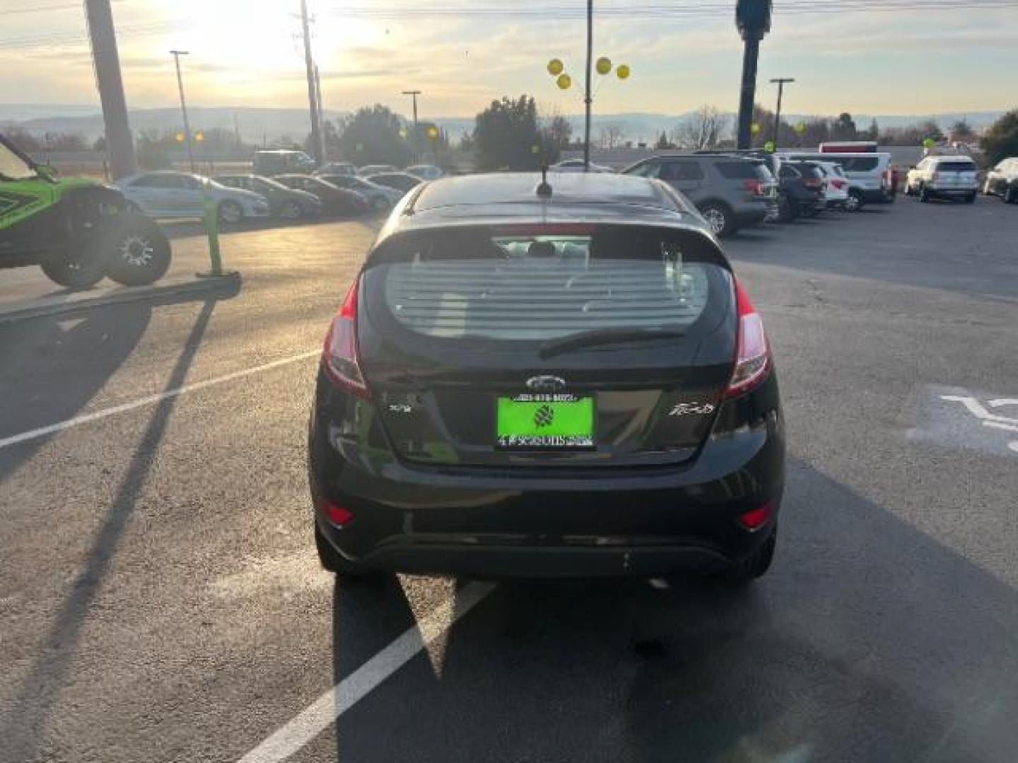 2014 Tuxedo Black Metalli /Charcoal Black Ford Fiesta SE Hatchback (3FADP4EJ0EM) with an 1.6L L4 DOHC 16V engine, 6-Speed Automatic transmission, located at 1865 East Red Hills Pkwy, St. George, 84770, (435) 628-0023, 37.120850, -113.543640 - We specialize in helping ALL people get the best financing available. No matter your credit score, good, bad or none we can get you an amazing rate. Had a bankruptcy, divorce, or repossessions? We give you the green light to get your credit back on the road. Low down and affordable payments that fit - Photo#5