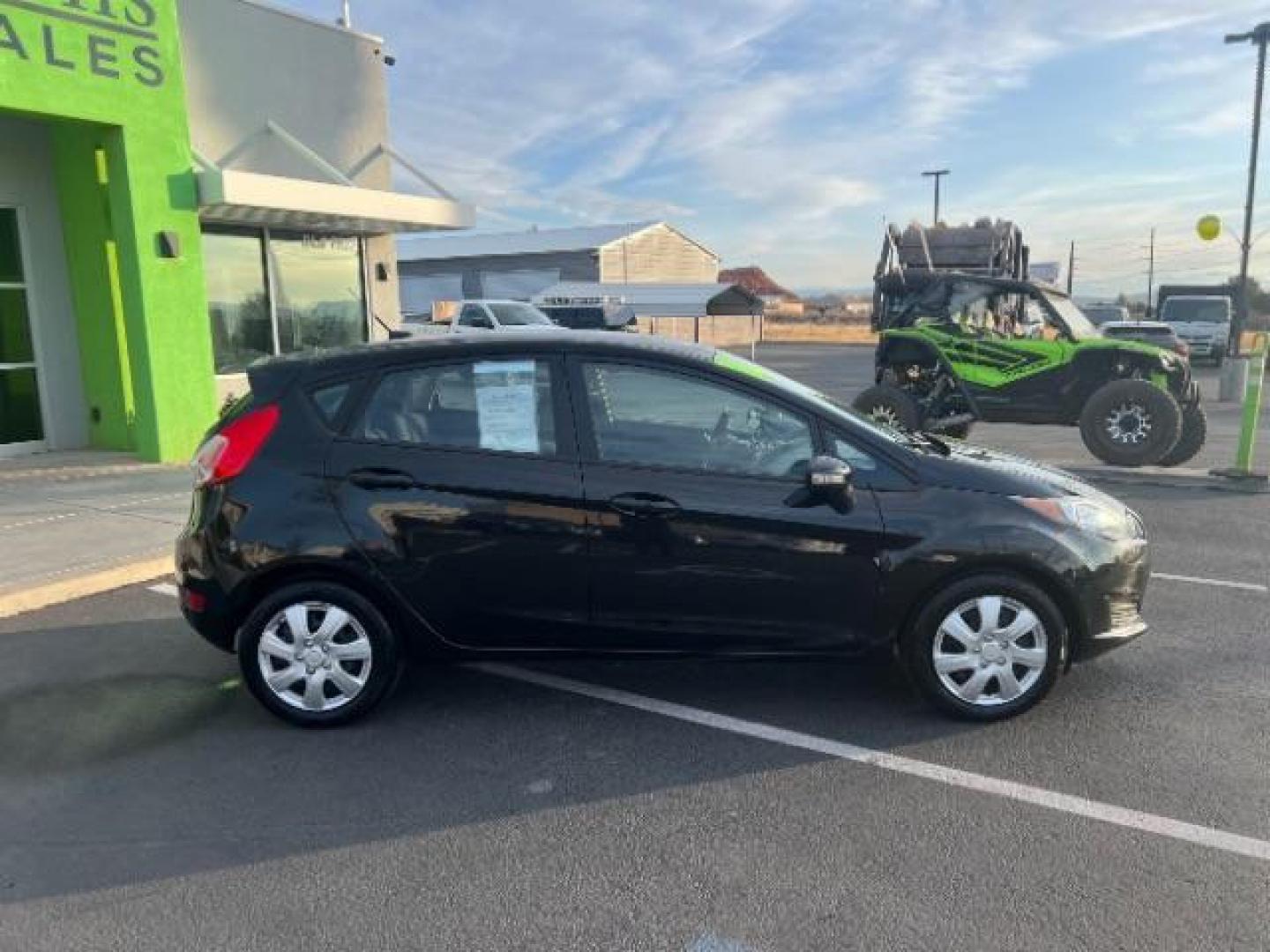 2014 Tuxedo Black Metalli /Charcoal Black Ford Fiesta SE Hatchback (3FADP4EJ0EM) with an 1.6L L4 DOHC 16V engine, 6-Speed Automatic transmission, located at 1865 East Red Hills Pkwy, St. George, 84770, (435) 628-0023, 37.120850, -113.543640 - We specialize in helping ALL people get the best financing available. No matter your credit score, good, bad or none we can get you an amazing rate. Had a bankruptcy, divorce, or repossessions? We give you the green light to get your credit back on the road. Low down and affordable payments that fit - Photo#7