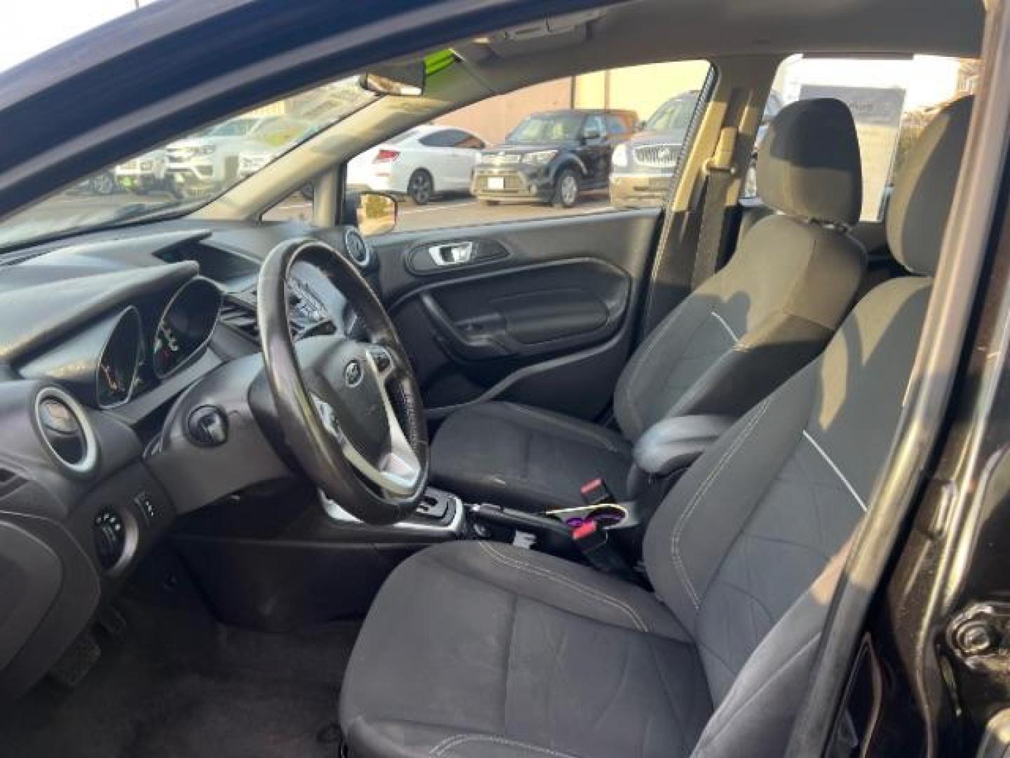 2014 Tuxedo Black Metalli /Charcoal Black Ford Fiesta SE Hatchback (3FADP4EJ0EM) with an 1.6L L4 DOHC 16V engine, 6-Speed Automatic transmission, located at 1865 East Red Hills Pkwy, St. George, 84770, (435) 628-0023, 37.120850, -113.543640 - We specialize in helping ALL people get the best financing available. No matter your credit score, good, bad or none we can get you an amazing rate. Had a bankruptcy, divorce, or repossessions? We give you the green light to get your credit back on the road. Low down and affordable payments that fit - Photo#14