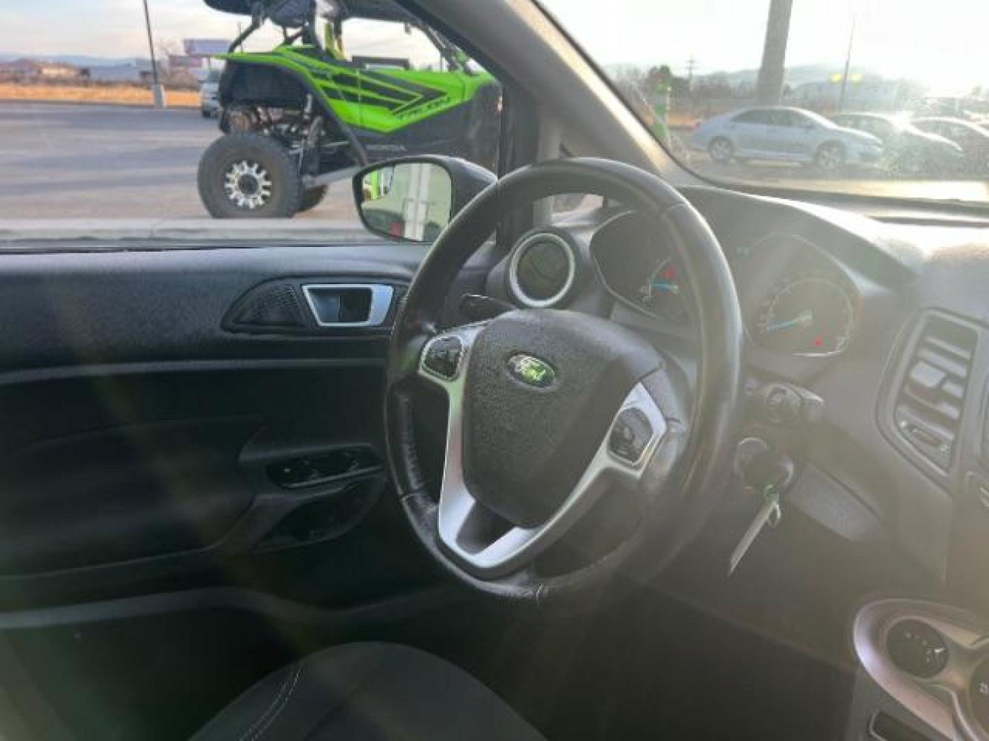 2014 Tuxedo Black Metalli /Charcoal Black Ford Fiesta SE Hatchback (3FADP4EJ0EM) with an 1.6L L4 DOHC 16V engine, 6-Speed Automatic transmission, located at 1865 East Red Hills Pkwy, St. George, 84770, (435) 628-0023, 37.120850, -113.543640 - We specialize in helping ALL people get the best financing available. No matter your credit score, good, bad or none we can get you an amazing rate. Had a bankruptcy, divorce, or repossessions? We give you the green light to get your credit back on the road. Low down and affordable payments that fit - Photo#31