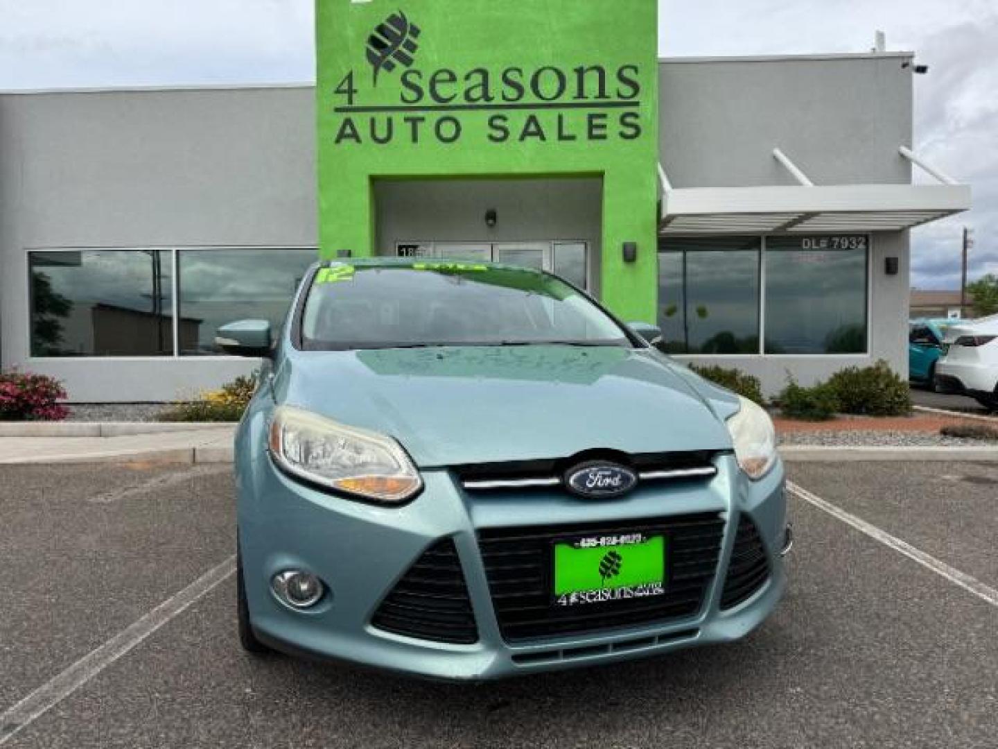 2012 Kona Blue Metallic /Medium Light Stone C Ford Focus SEL (1FAHP3M20CL) with an 2.0L L4 DOHC 16V engine, 6-Speed Automatic transmission, located at 940 North Main Street, Cedar City, UT, 84720, (435) 628-0023, 37.692936, -113.061897 - Photo#0