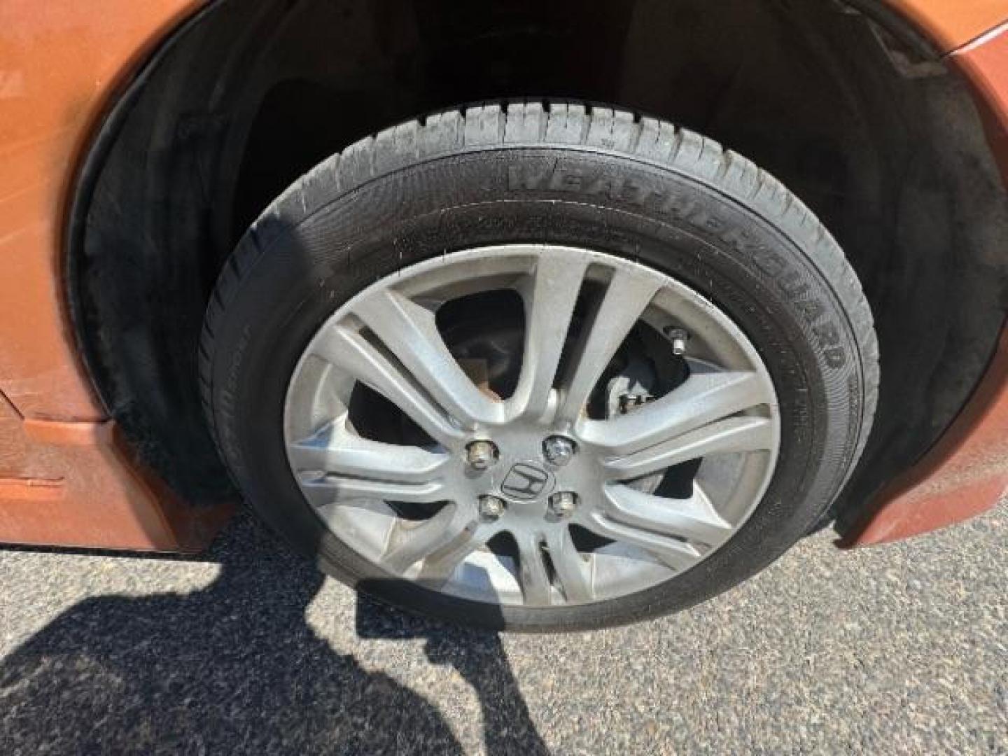 2009 Orange Revolution Me /Black Cloth Interior Honda Fit Sport 5-Speed AT (JHMGE88409S) with an 1.5L L4 SOHC 16V engine, 5-Speed Automatic transmission, located at 1865 East Red Hills Pkwy, St. George, 84770, (435) 628-0023, 37.120850, -113.543640 - Photo#12