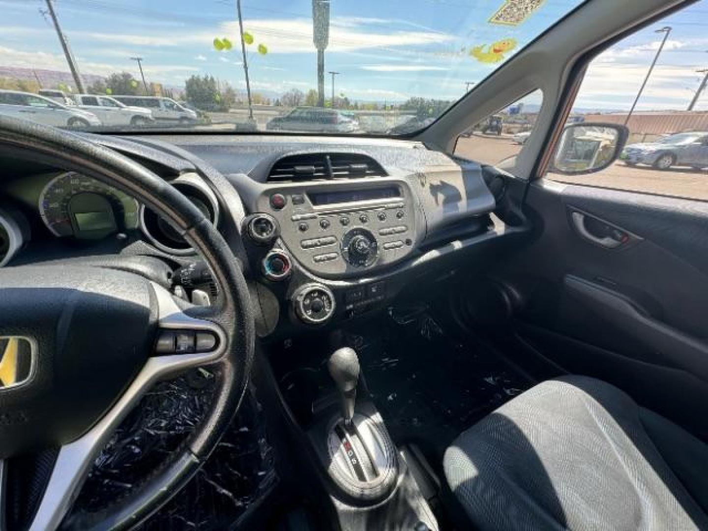 2009 Orange Revolution Me /Black Cloth Interior Honda Fit Sport 5-Speed AT (JHMGE88409S) with an 1.5L L4 SOHC 16V engine, 5-Speed Automatic transmission, located at 1865 East Red Hills Pkwy, St. George, 84770, (435) 628-0023, 37.120850, -113.543640 - Photo#18