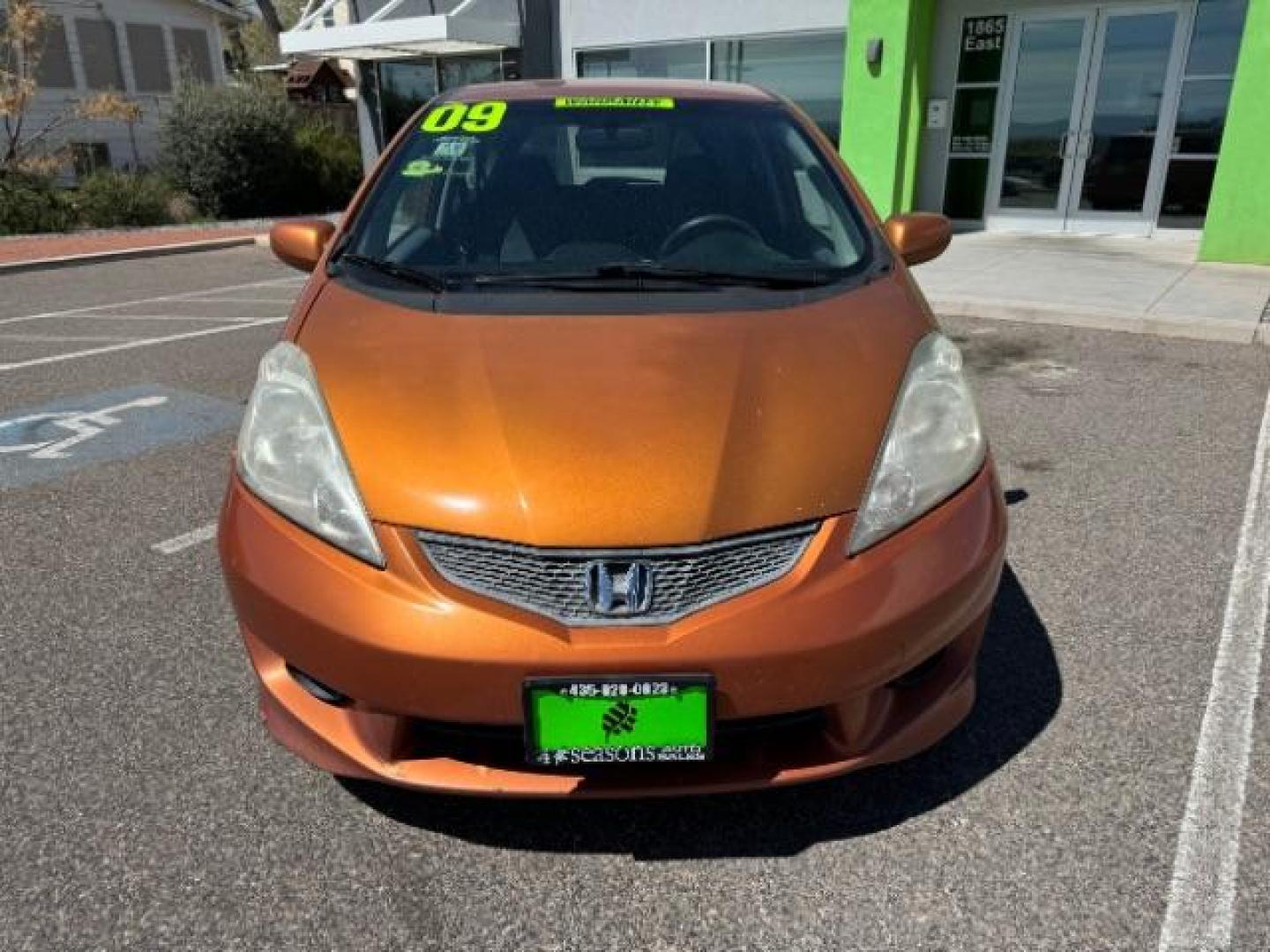 2009 Orange Revolution Me /Black Cloth Interior Honda Fit Sport 5-Speed AT (JHMGE88409S) with an 1.5L L4 SOHC 16V engine, 5-Speed Automatic transmission, located at 1865 East Red Hills Pkwy, St. George, 84770, (435) 628-0023, 37.120850, -113.543640 - Photo#2