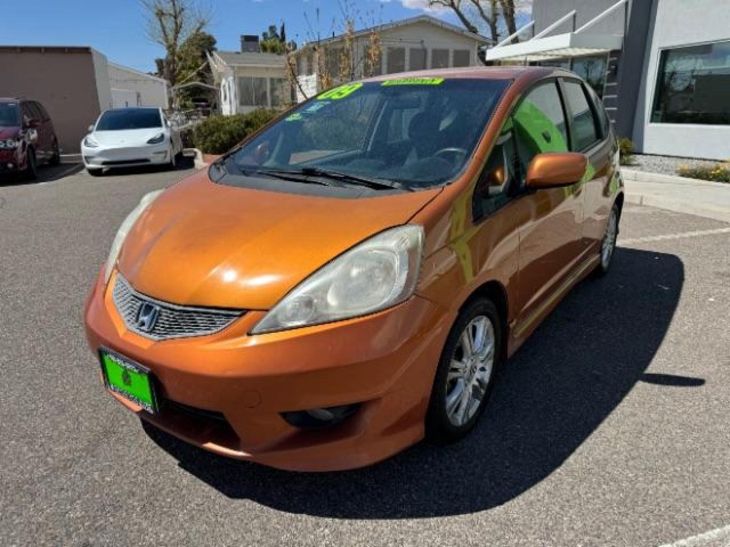 2009 Orange Revolution Me /Black Cloth Interior Honda Fit Sport 5-Speed AT (JHMGE88409S) with an 1.5L L4 SOHC 16V engine, 5-Speed Automatic transmission, located at 1865 East Red Hills Pkwy, St. George, 84770, (435) 628-0023, 37.120850, -113.543640 - Photo#3