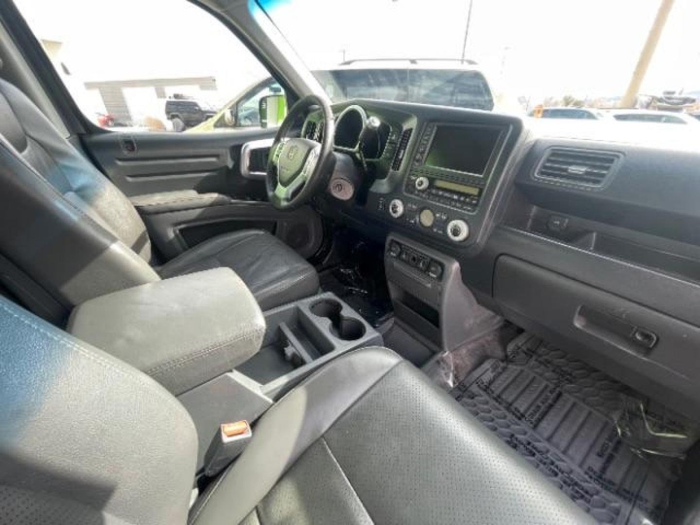 2008 Billet Silver Metallic /Gray Leather Interior Honda Ridgeline RTL (2HJYK16598H) with an 3.5L V6 SOHC 24V engine, 5-Speed Automatic transmission, located at 1865 East Red Hills Pkwy, St. George, 84770, (435) 628-0023, 37.120850, -113.543640 - Photo#31