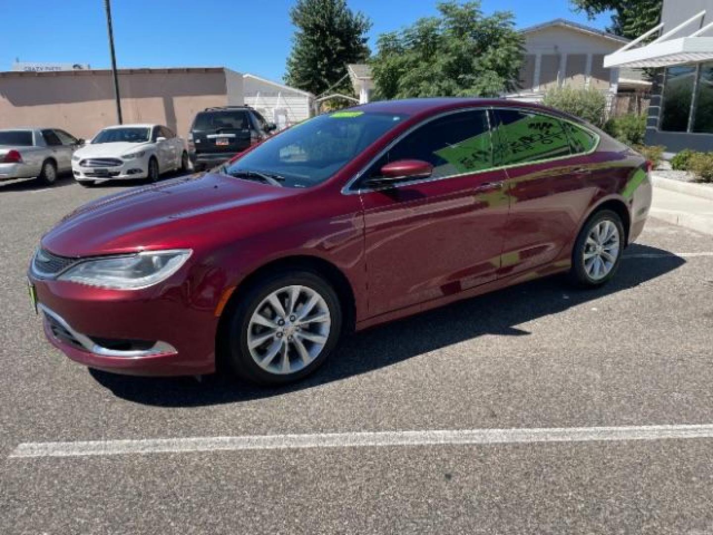 2015 Velvet Red Pearlcoat /Black Chrysler 200 C (1C3CCCCBXFN) with an 2.4L L4 DOHC 16V engine, 9-Speed Automatic transmission, located at 1865 East Red Hills Pkwy, St. George, 84770, (435) 628-0023, 37.120850, -113.543640 - Photo#4