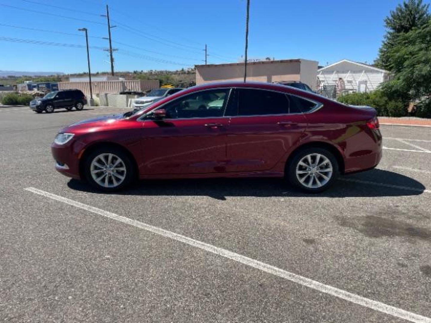 2015 Velvet Red Pearlcoat /Black Chrysler 200 C (1C3CCCCBXFN) with an 2.4L L4 DOHC 16V engine, 9-Speed Automatic transmission, located at 1865 East Red Hills Pkwy, St. George, 84770, (435) 628-0023, 37.120850, -113.543640 - Photo#5