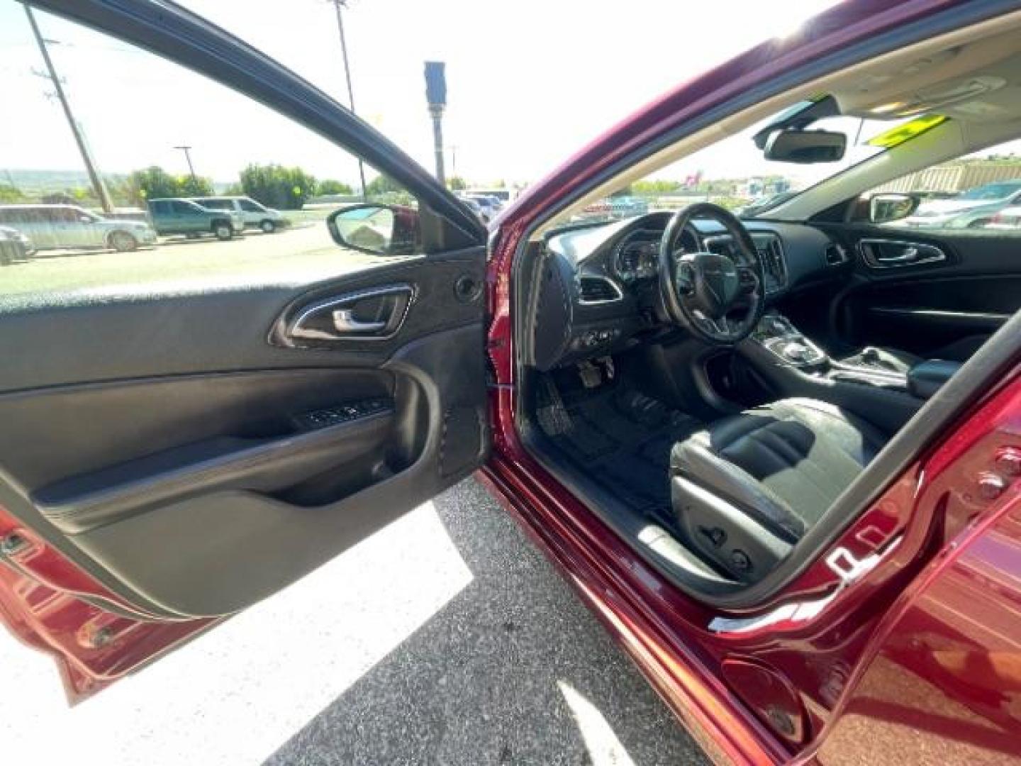 2015 Velvet Red Pearlcoat /Black Chrysler 200 C (1C3CCCCBXFN) with an 2.4L L4 DOHC 16V engine, 9-Speed Automatic transmission, located at 1865 East Red Hills Pkwy, St. George, 84770, (435) 628-0023, 37.120850, -113.543640 - Photo#16